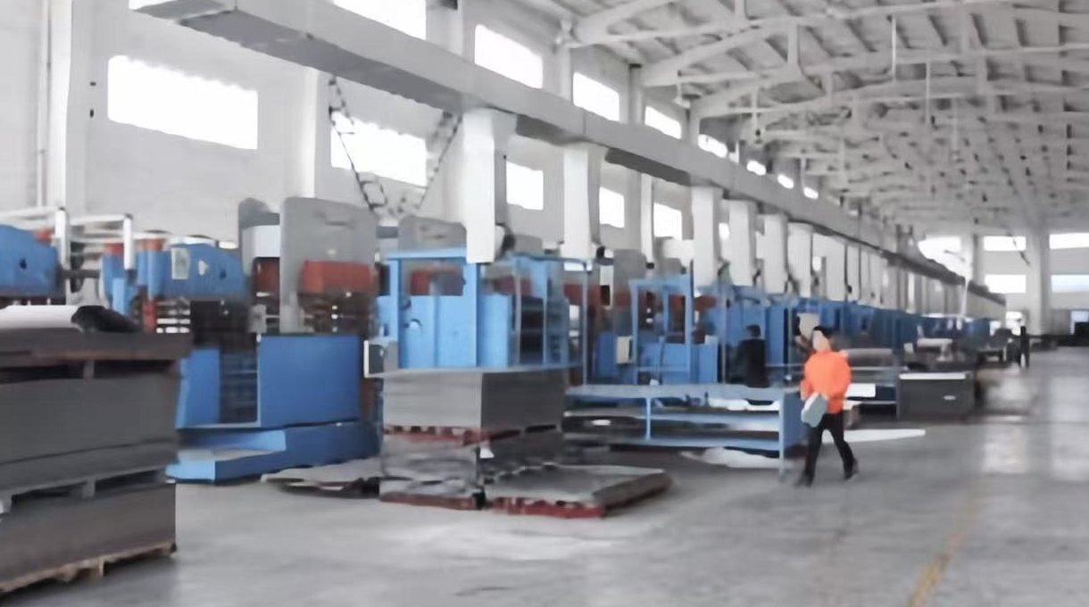Hot press machines in the production hall